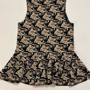 Kenzo thick knit top with Black and Tan Animal Print.  Peplum bottom. tank style